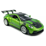 Green diecast sports model car with black hood stripes and rear spoiler.
