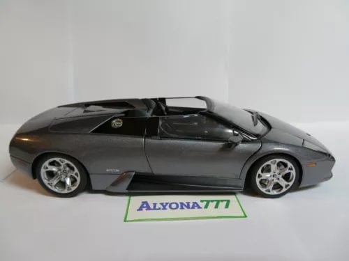 Gray diecast Lamborghini roadster model with open doors, 1:18 scale