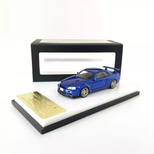 Bayside blue diecast model car on black display base, open-top presentation box