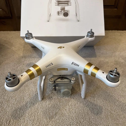 DJI Phantom 3 SE drone, white quadcopter with camera gimbal and four propellers