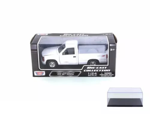 Diecast pickup truck in display case, white cab with dark grille