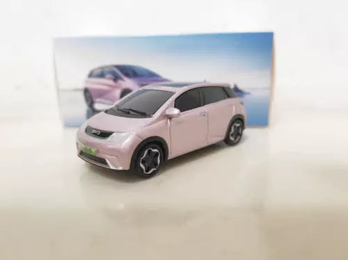 1/64 scale BYD Dolphin EV pink diecast model car with black wheels