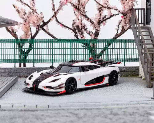 1:64 scale white racing sports diecast car model with black wheels