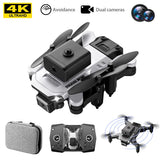 Folding quadcopter drone with 4 blades, dual cameras, and carrying bag
