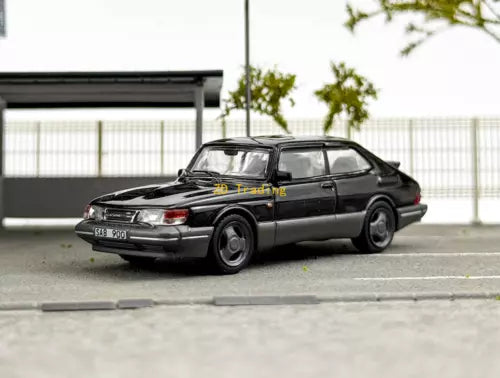 Black 1:64 diecast hatchback sports car model with detailed front grille