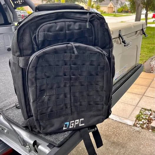 Black drone backpack with front padded organizer panel and adjustable straps
