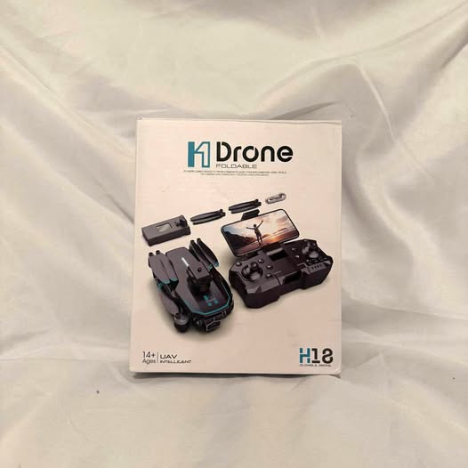 Drone accessory kit box showing H12 drone with controllers and charging parts