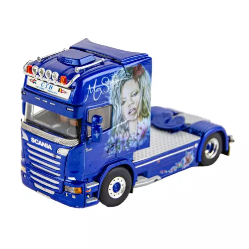 Blue Scania streamline diecast truck cab with detailed grille and illustrated graphics