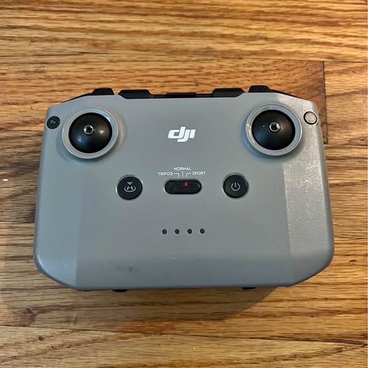 DJI RC231 remote controller with dual joysticks, light gray body