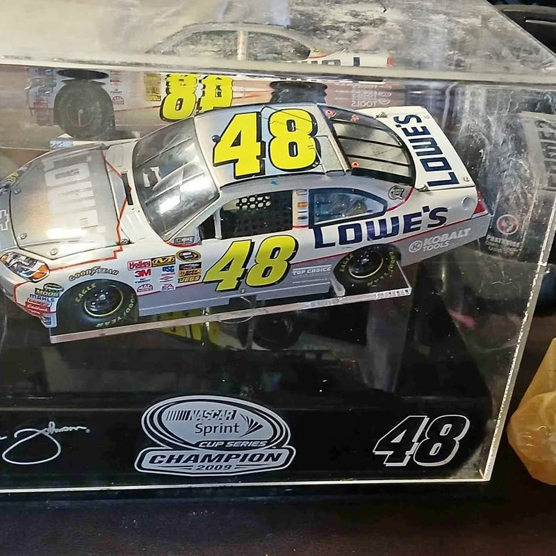 Diecast NASCAR stock car replica, white with blue #48 and sponsor decals.