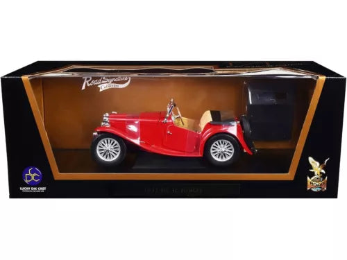 Red MG TC midget diecast model car in display case