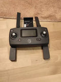 Drone controller with LCD screen, two joysticks, and two antennas