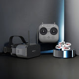 FPV racing drone kit with controller, goggles, and compact quadcopter on stand