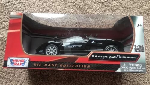 Black 1:24 Pagani race car diecast in retail box, Nurburgring graphics