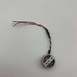 Drone mini power motor with circular mount and red-and-black wires