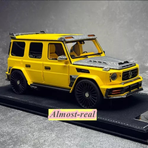 Mansory 1/18 diecast model SUV in yellow with black wheels and grille detail