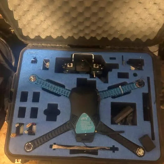 Iris++drone parts kit in blue foam case with drone arms