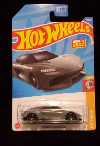 Die-cast supercar model in blister pack, dark gray finish