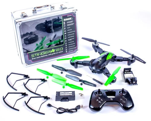 Green and black FPV RC drone with quadcopter propellers and remote controller