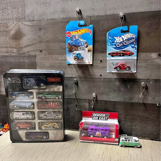Hot Wheels diecast car set with boxed cars and loose mini cars, red and blue