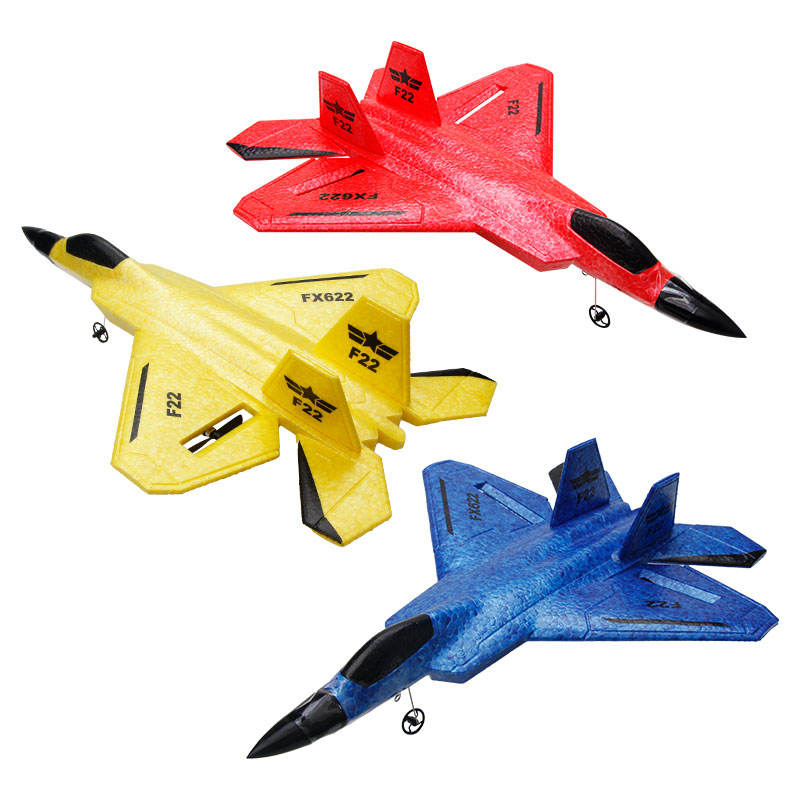 Foam RC fighter aircraft toy in red, yellow, and blue with wing details