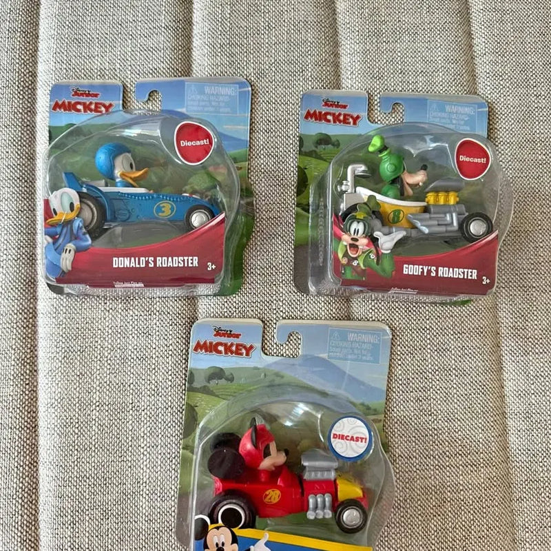 Disney diecast roadster lot of 3 in retail boxes featuring Donald, Goofy, and Mickey