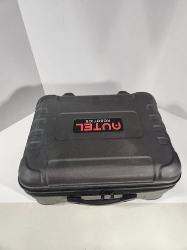 Black hard shell drone case with molded handle and latch