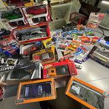 Boxed diecast car lot with multiple Dodge Challenger models and memorabilia, assorted scales