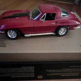 Maroon 1967 Chevrolet Corvette Sting Ray diecast car, side view with chrome details