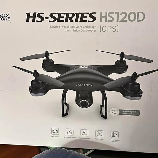 Black quadcopter drone with camera, four propellers and GPS module