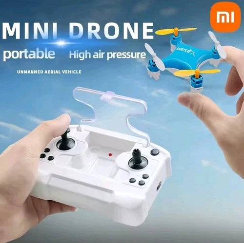 Mini drone with HD camera 4K and white handheld controller, blue quadcopter