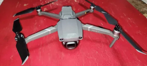 DJI Mavic 2 Pro drone with propellers, gray body