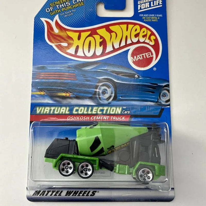 Green and black diecast cement truck toy in retail blister package