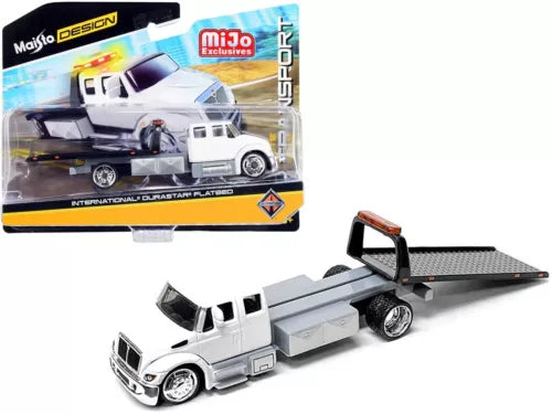 White diecast tow truck flatbed model with open loading bed and black wheels