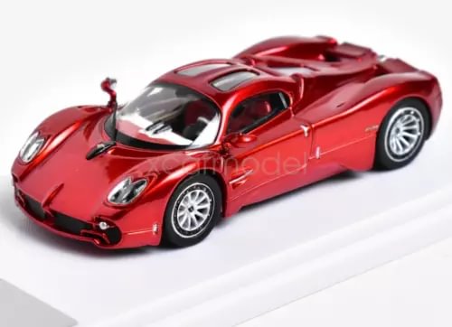 1:64 scale diecast metal racing car model, red with open cockpit and white wheels