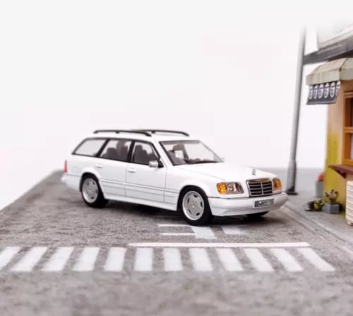 1:64 white diecast wagon car model toy, front three-quarter view