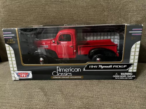 Red 1941 Plymouth pickup truck diecast model in retail box