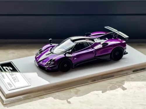 Purple sports racing diecast model car with open hood details