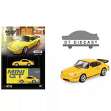 Yellow Porsche diecast model car, front three-quarter view