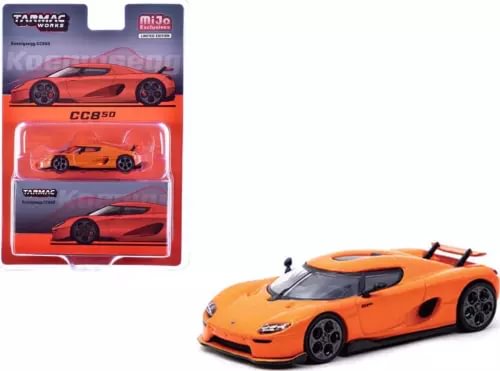 Orange metallic CC850 diecast sports car model with black wheels, front 3/4 view