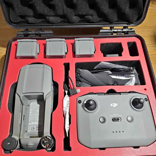DJI Mavic Air 2 drone in red carrying case, with spare battery