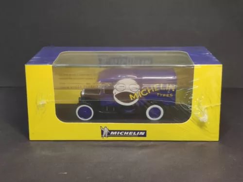 Diecast Ford T pickup truck in clear display box with Michelin logo, dark blue