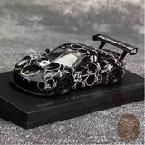 Black Porsche 911 GT3 R race car diecast model with wing and decals