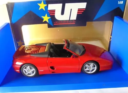 Red Ferrari F355 Spider 1:18 diecast model car in retail box