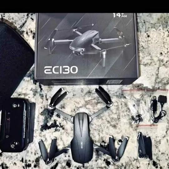 RC drone with 4 propellers, central body and monitor