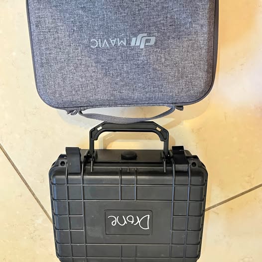 DJI drone hard case with built-in handle and latching panel