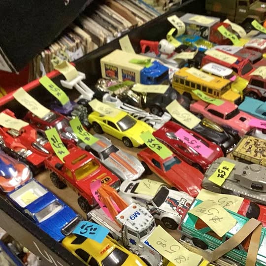 Assorted diecast cars and trucks, mixed colors and styles
