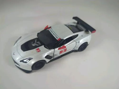 Gray and white diecast sports car with black hood and red racing stripe