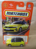 Yellow Opel Astra 1:64 diecast car in Matchbox packaging, model #87 2022