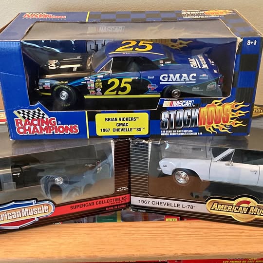 Blue 1967 Chevelle diecast race car with #25 decals and GMAC markings